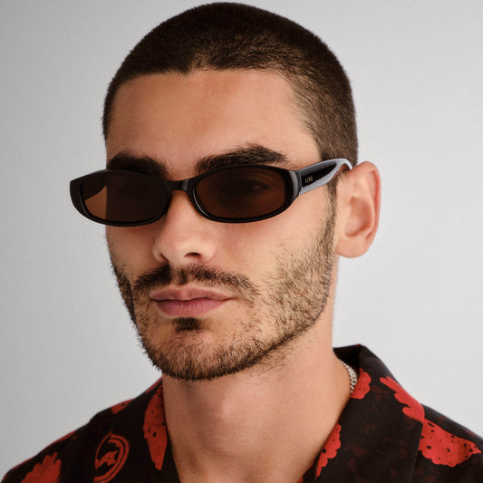 Caellum Black Uni-Sex Oval Sunglasses | Aire