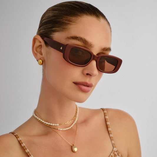 Ceres Burgundy Female Rectangle Sunglasses | Aire