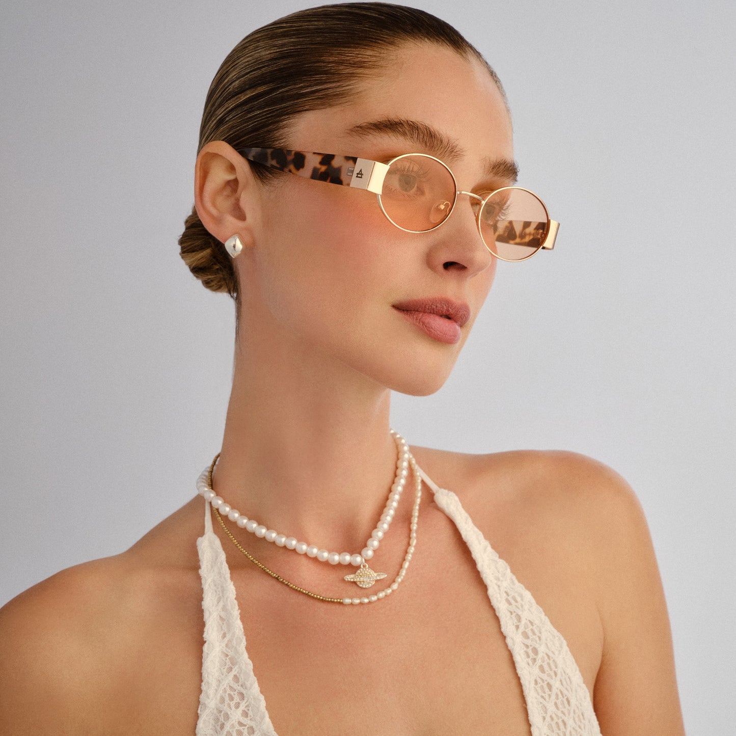Mars Ii Gold Female Oval Sunglasses | Aire