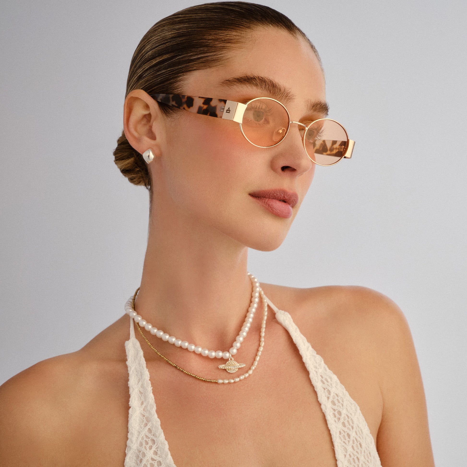 Mars Ii Gold Female Oval Sunglasses | Aire