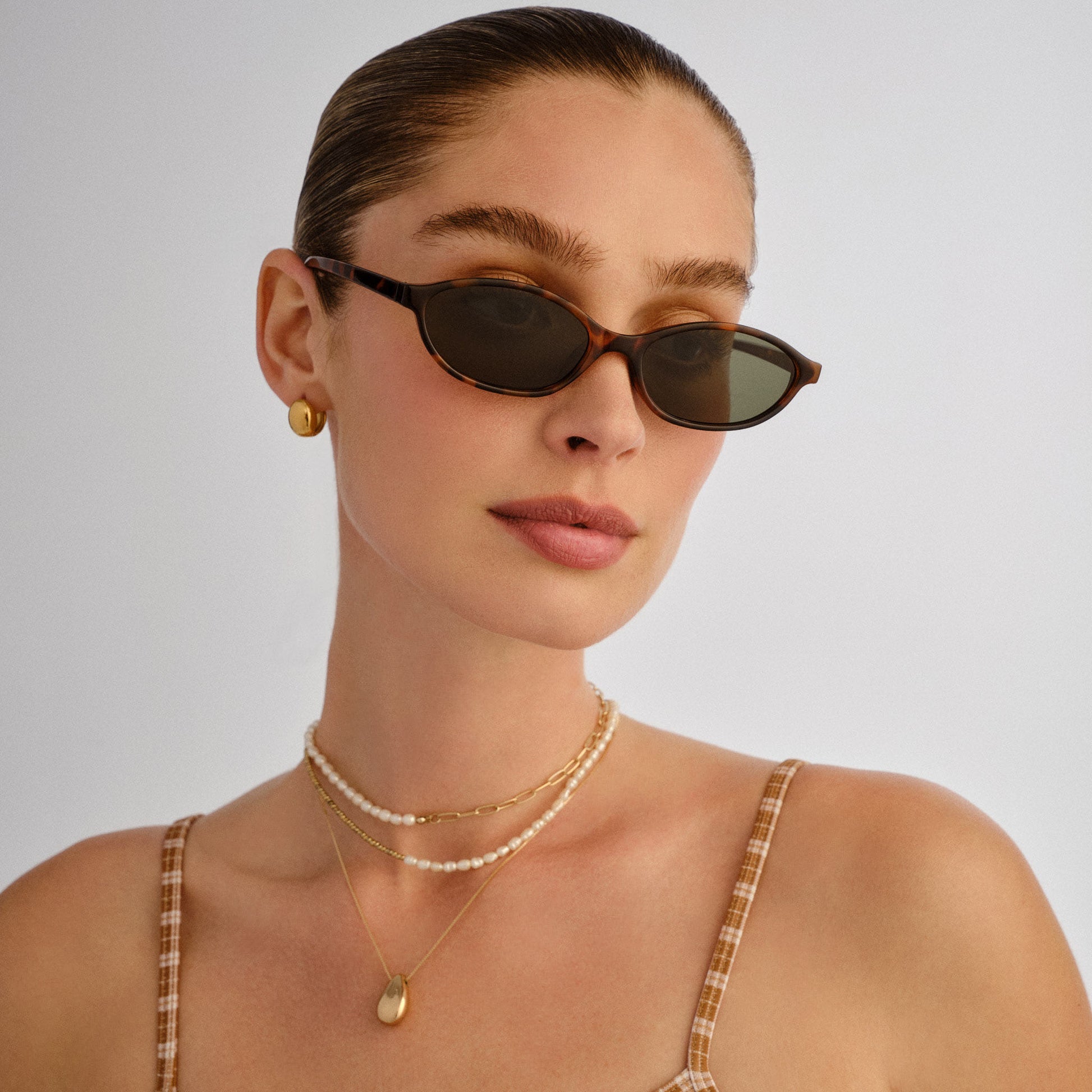 Earthshine Dark Tort Female Oval Sunglasses | Aire