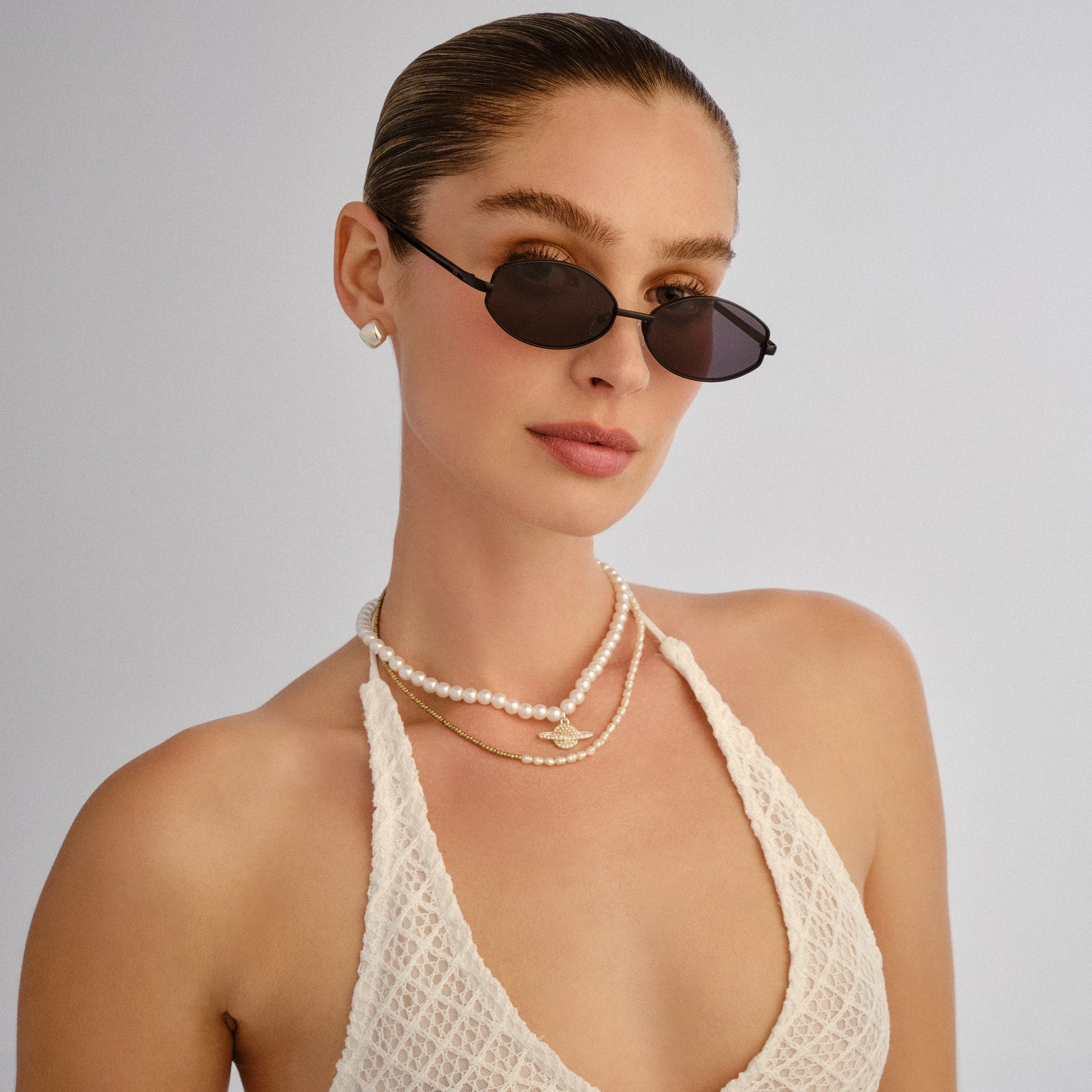 Objective Black Female Oval Sunglasses | Aire