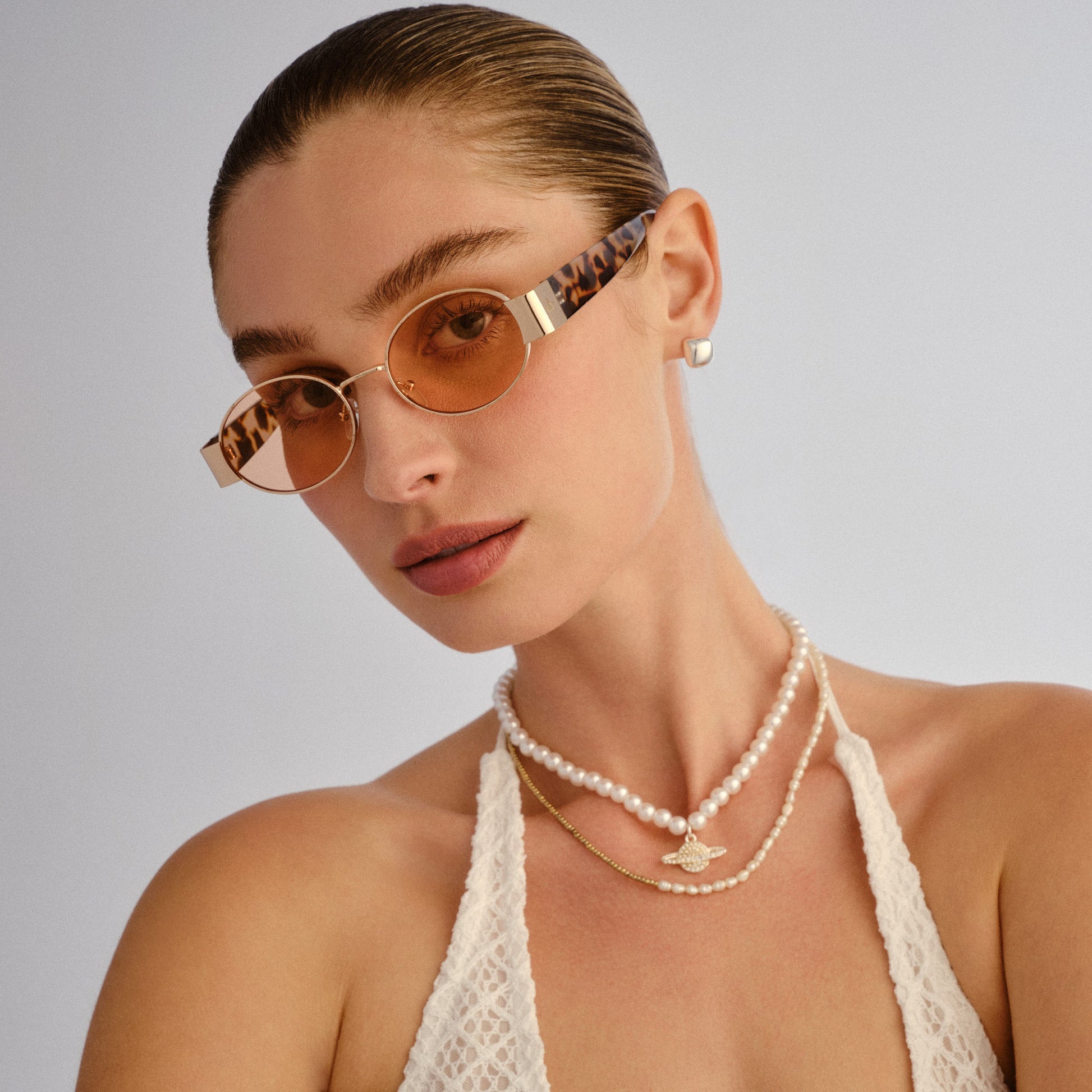 Mars Ii Gold Female Oval Sunglasses | Aire