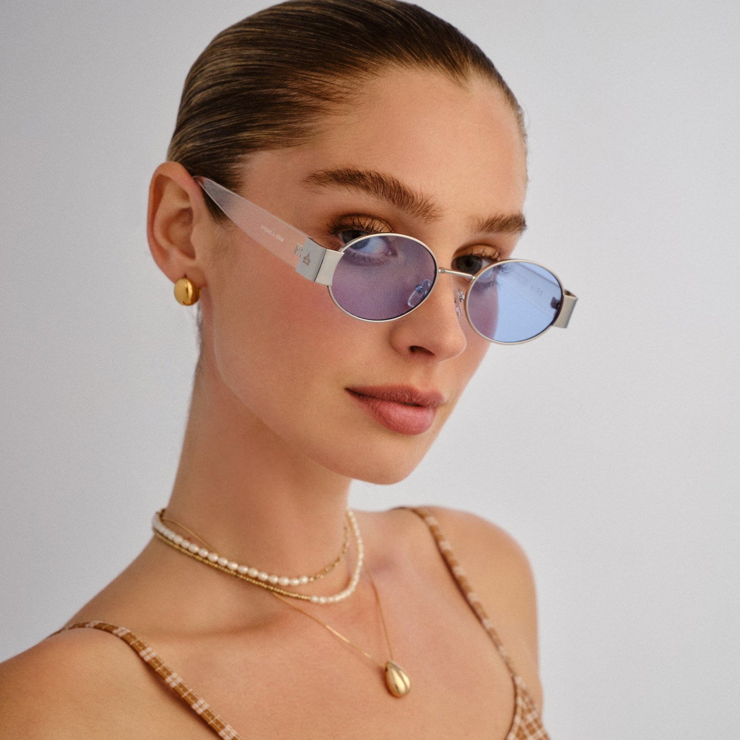 Mars Ii Silver Female Oval Sunglasses | Aire